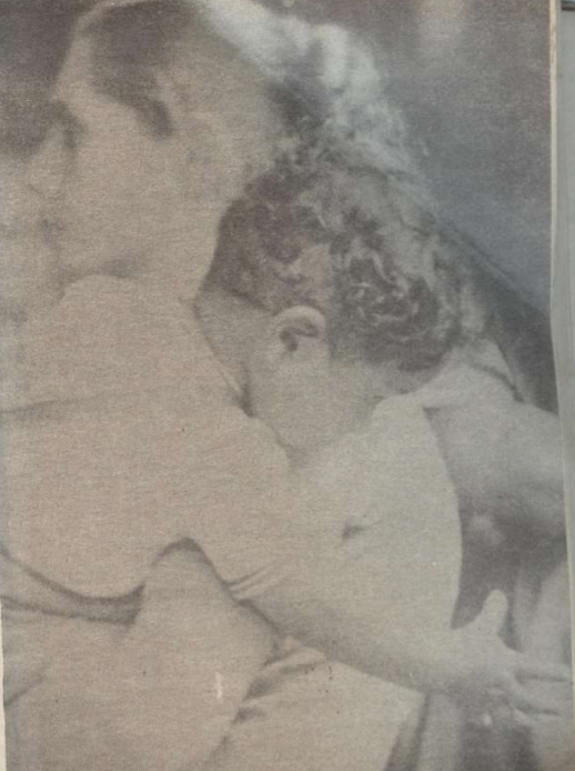 Niño en brazos